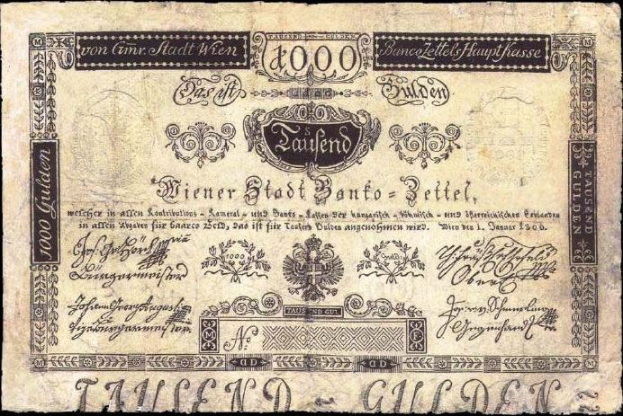 Eine 1000-Pfennig-Banknote der Deutschen Bundesbank, ausgestellt im Jahr 1900, zeigt das Porträt eines Mannes auf schwarzem Hintergrund.