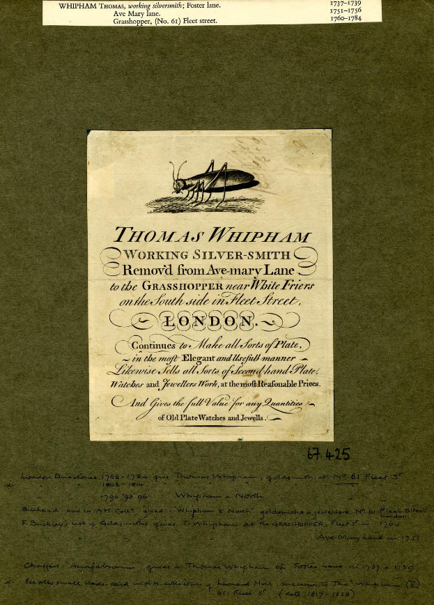 Altes Buch mit einer Illustration eines Grashüpfers auf dem Cover und gedrucktem Text auf den Seiten.